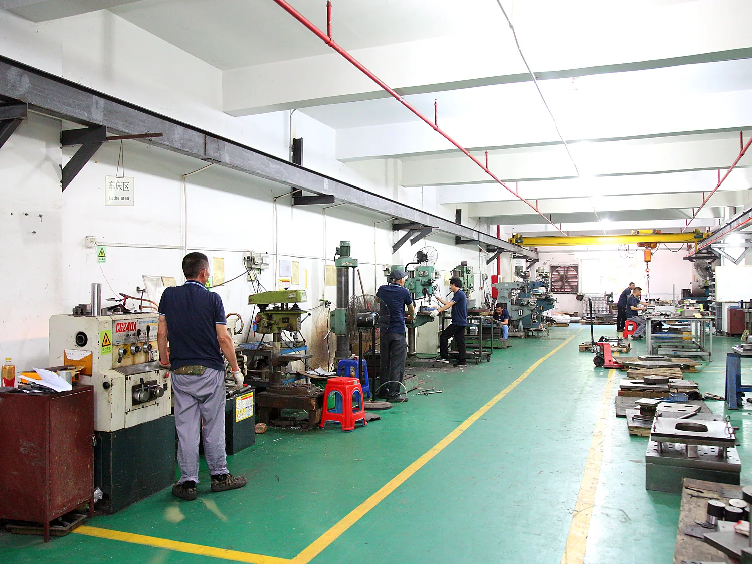 Row of presses in the production aisle